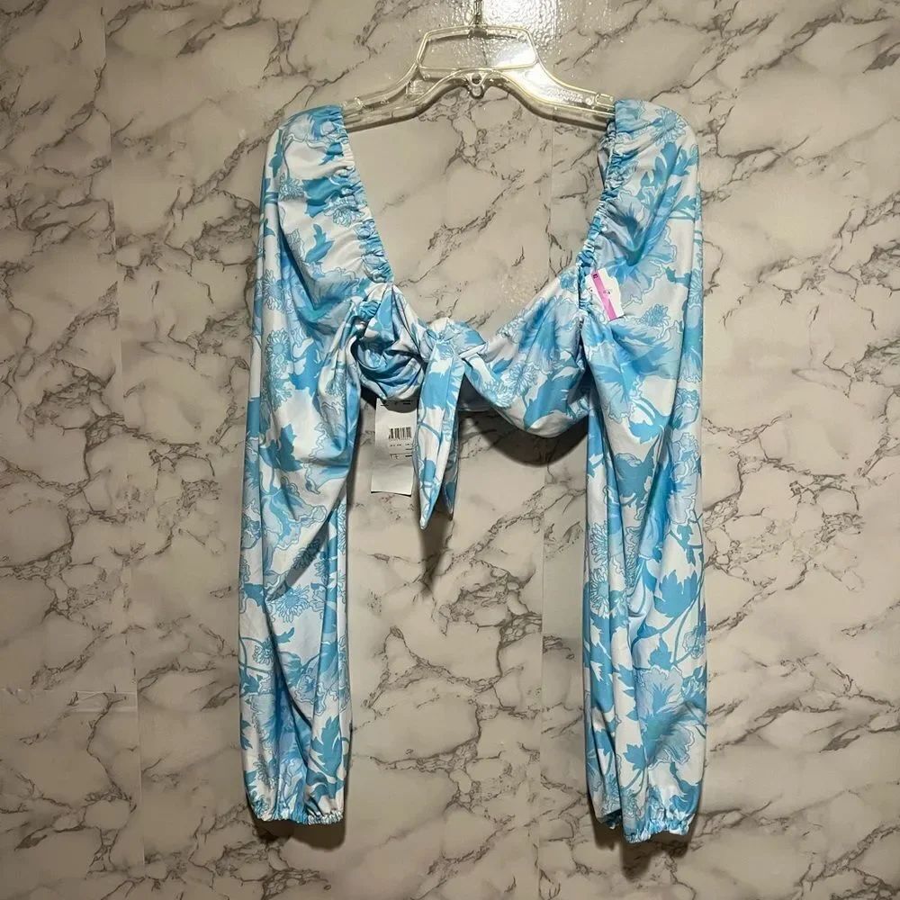ASOS DESIGN tie front long sleeve bikini top in blue floral print